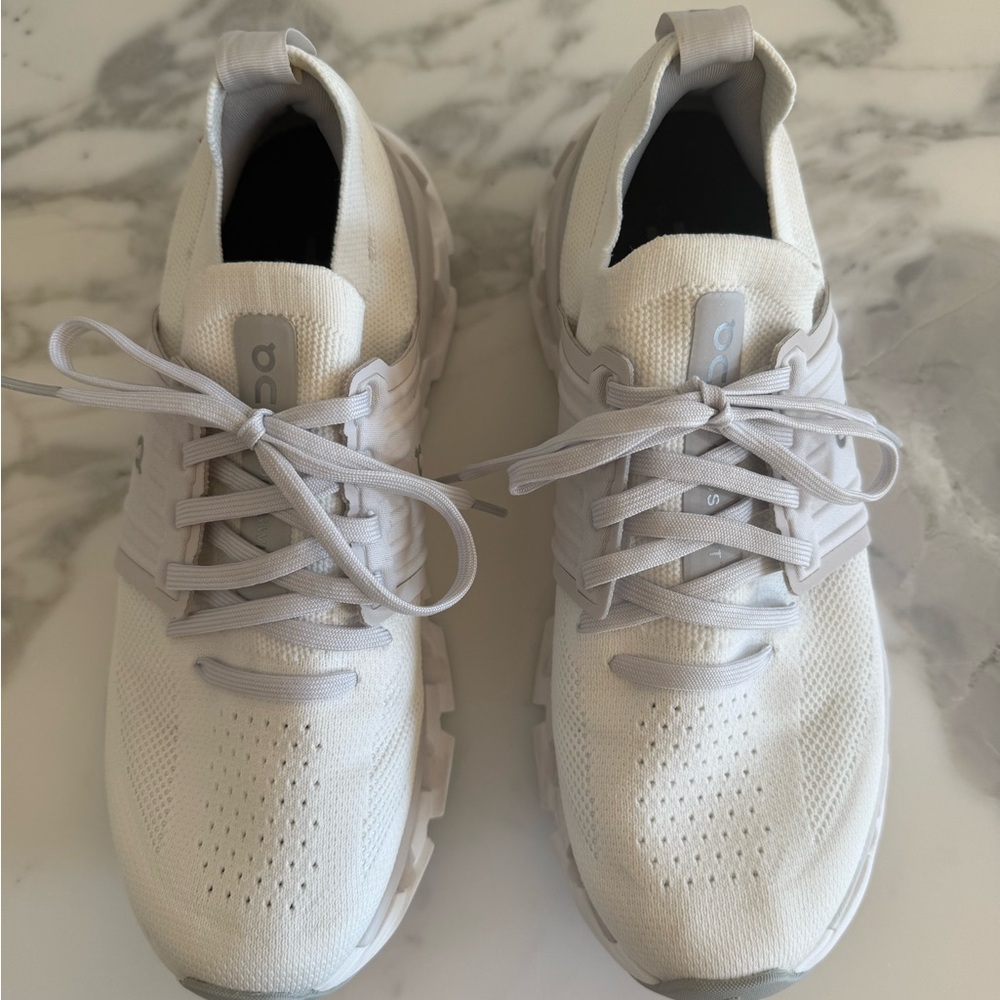 On Clouds women’s athletic shoes in white size 8